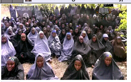 File: A screengrab taken on May 12, 2014, from a video of Nigerian Islamist extremist group Boko Haram obtained by AFP shows girls, wearing the full-length hijab and praying in an undisclosed rural location. Boko Haram released a new video on claiming to show the missing Nigerian schoolgirls, alleging they had converted to Islam and would not be released until all militant prisoners were freed. A total of 276 girls were abducted on April 14 from the northeastern town of Chibok, in Borno state, which has a sizeable Christian community. Some 223 are still missing. 