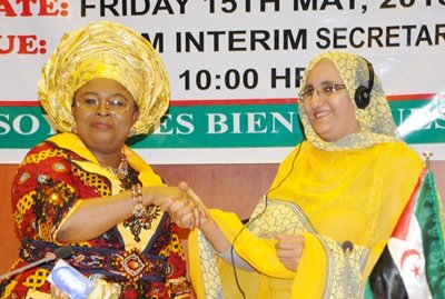 PIC. 15.FORMER PRESIDENT, AFRICAN FIRST LADIES PEACE MISSION (AFLPM), DAME PATIENCE JONATHAN (L), HANDING OVER TO HER SUCCESSOR, JADIYA HAMDI MOHAMED, FIRST LADY OF SAHRAWI ARAB DEMOCRATIC REPUBLIC, AT THE EMERGENCY 8TH SUMMIT OF THE AFLPM IN ABUJA ON FRIDAY (15/5/15). 2617/15/5/2015/BJO/CH/NAN