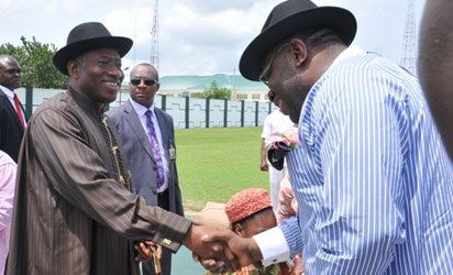 President Goodluck Jonathan (L), being received by the Bayelsa State Governor, Hon. Seriake Dickson, on arrival at the Government House helipad, Yenagoa, for his daughter’s marriage ceremony.